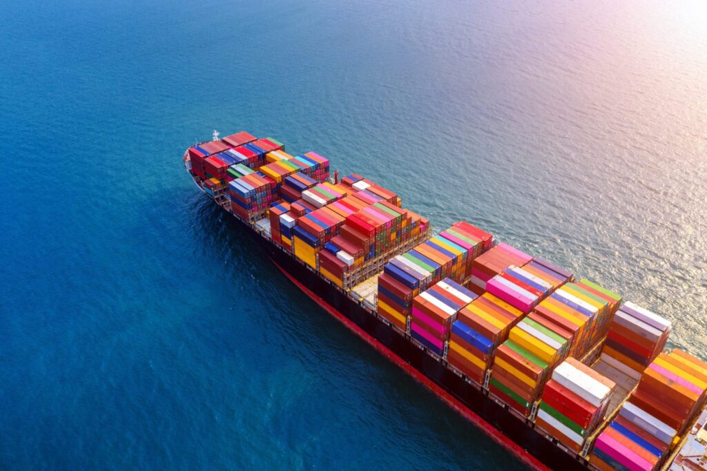 aerial-view-container-cargo-ship-sea-scaled